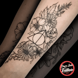#tattooart #black #blacktattoo #linework #flower #deathlyhallows 