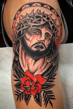 Jesus piece by @zimovan. #jesus #religious #rose #bright #traditional #traditionaltattoo #nctattooers #ashevillenc 
