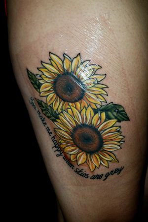 My sunflowers done by Nate Davenport at Anchored Art Tattoo and Gallery in Spokane, Washington.