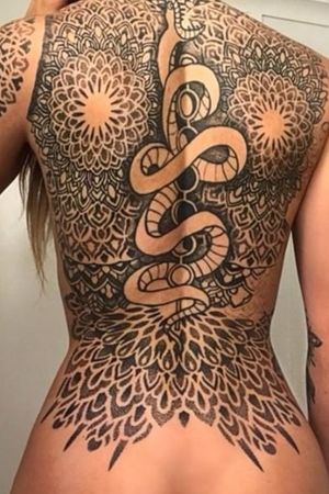 Back piece in progress. Snake not by me