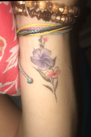small and simple flower on wrist 