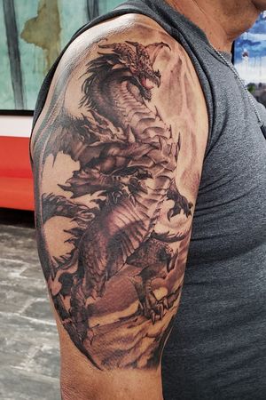 Tackled this dragon last night.. props to the client on his first tattoo