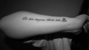 My Harry Potter tattoo #HarryPotterTattoos #harrypotter #deathlyhallows #armtattoo #quotetattoo #script #scripttattoos #sidearm #quote #jkrowling  #nerdtattoo 