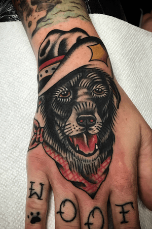 Tattoo by @zimovan #handtattoo #dogtattoo #dog #cowboy #pettattoo #pet #bandana #bright #brighttattoos #traditional #traditionaltattoo #AmericanTraditional #ashevillenc #nctattooers 