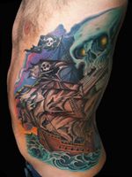 Tattoo by Chad Clark. #shiptattoo #piratetattoo #pirateshiptattoo #floridatattooartist #capecoral #jollyrogertattoo #tophatclassictattoo #colortattoo #traditional #traditionaltattoo #realism #coveruptattoo