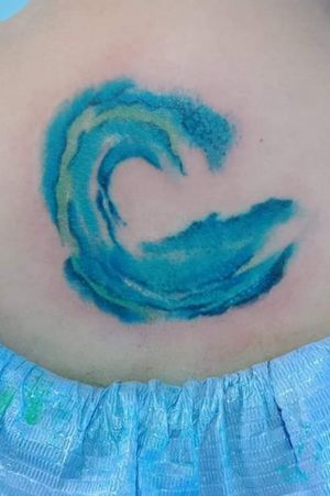 Custom wave tattoo