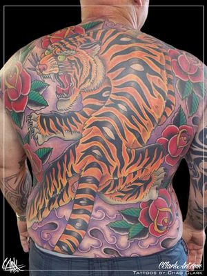 Top Hat Classic Tattoo 
Cape Coral, Florida
Tattoos by Chad Clark 
@c.clarkart
#backpiecetattoo #traditional #tigertattoo #rosetattoo #tigerbackpiece  