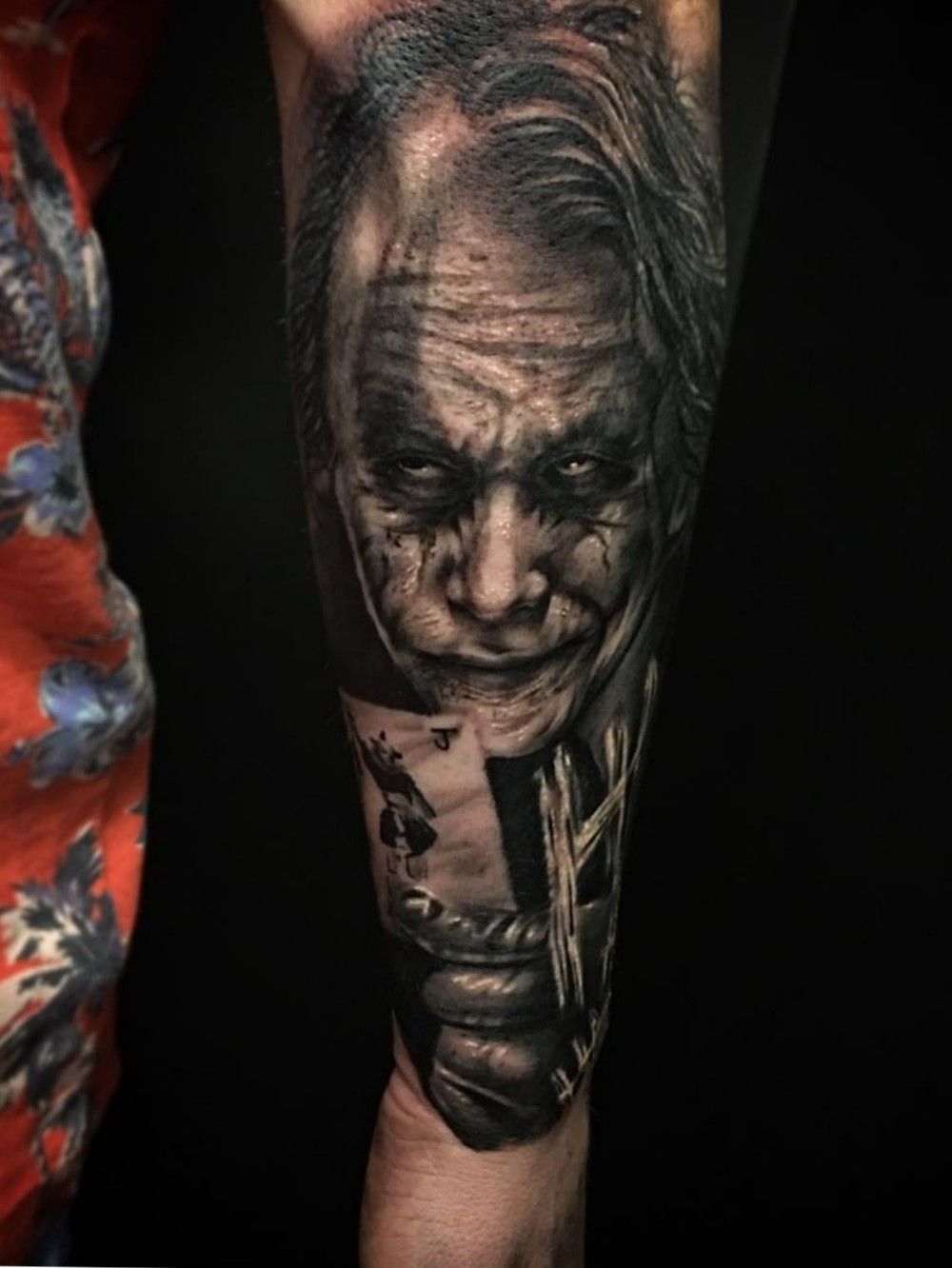 Tattoo uploaded by Abel Miranda  Full sleeve tattoo in avantgarde style  Representation of Batmans Joker from The Dark knight movie   Tattoodo