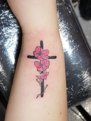 Simple cross with some cherry blossoms. Yes she understood placement would leave here with an upside down cross at times. Message me to setup your next tattoo. Please like and follow me @tattooedbyjesse FB, IG, SC, pinterest, tumblr, twitter, tattoodo app, and for my artist page; www.facebook.com/tattooedbyjesse #TattooedByJesse #ComeGetSomeInk #LoyaltyTattooCompany #DynamicBlack #Fusioninks #EternalInks #Tattoo #Tattoos #MichiganTattooArtists #MichiganPiercers #Tattooed #Symbeos #symbeostattoomachines #cross #crosstattoo #cherryblossom #cherryblossomtattoo #flower #flowertattoo 