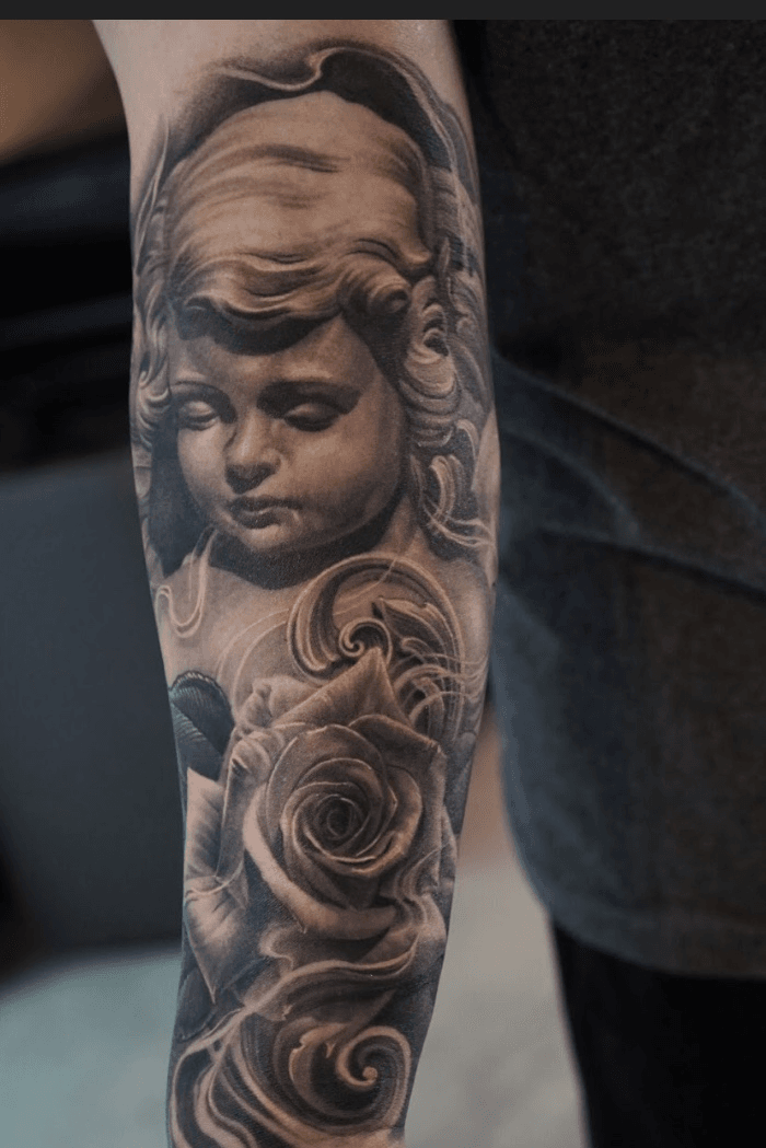 Realistic Cherub Angel with Clock in Black and Gray by Yarda  Tattoos
