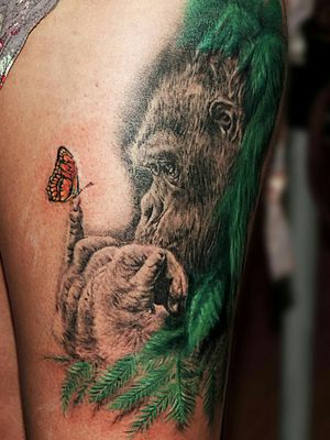 Gorilla and butterfly tattoo