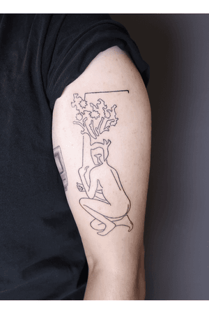 Handpoked single line figure and flora composition