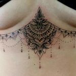 Under boob tattoo