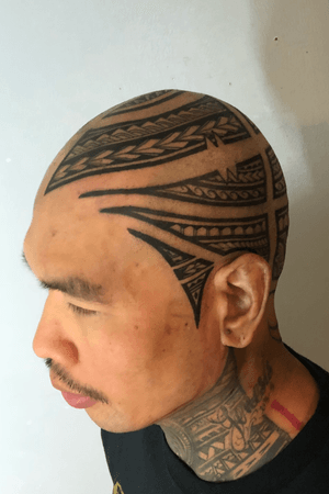 tribal hair tattoo
