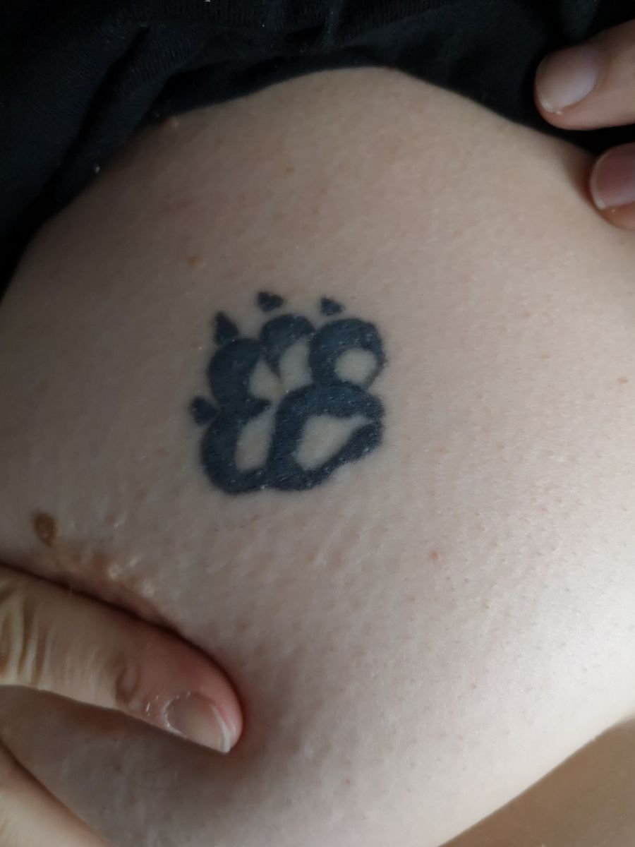 Tattoo uploaded by Kerstin • 1st tattoo Pawprint of a wolf on my right