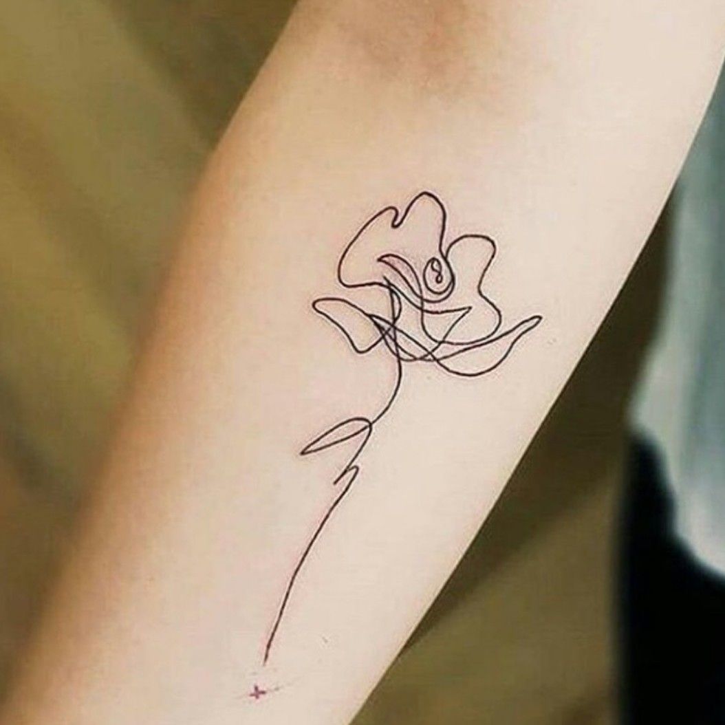 These strangely delicate tiny floral tattoos have the cleanest lines weve  ever seen  HelloGigglesHelloGiggles