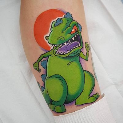 Tattoo by Steve Chater #SteveChater #Nickelodeontattoos #nickelodeon #nicktattoos #cartoontattoos #newschool #90scartoon #90s #color #cartoon #reptar #rugrats #dinosaur