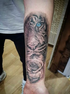 Half tiger with a rose and shading 