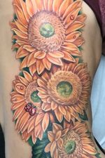 Sunflower side piece, check out instagram @sean_embers for the full tattoo!