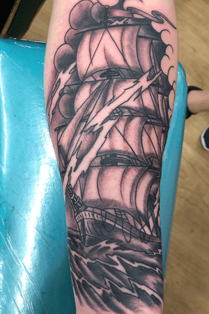 Strong clipper ship on a forearm/ start of his sleeve