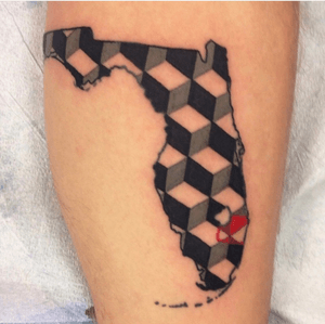 Florida tattoo with a fun geometric design on the inside. Done on the side of a leg. 