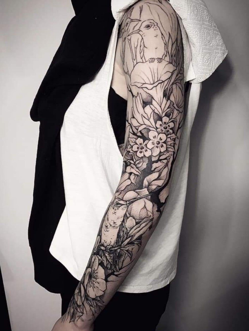 Traditional Women With Flying Bird And Anchor Tattoo On Full Sleeve
