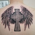 Cross and wings