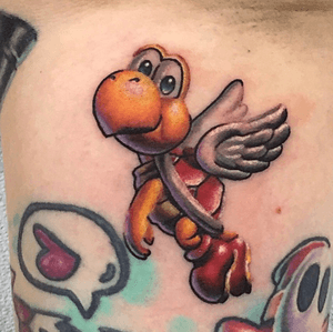 More super mario tattoos. This one is done near an armpit. 