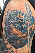 Zeus tattoo dine on a shoulder as part if a greek half sleeve. 