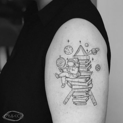 Reading #astronaut #tattooartist 