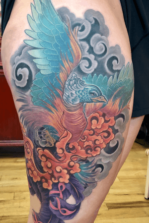 Color Pheonix on right thigh