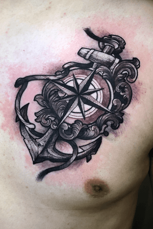 Antique anchor n compass tattoo on chest