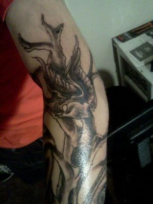 My 1st sleeve I did. Dead tree and zombie swallow. With graveyard