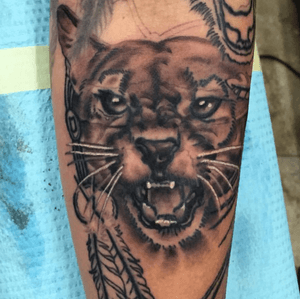 Florida panther done as part of a native american sleeve. 