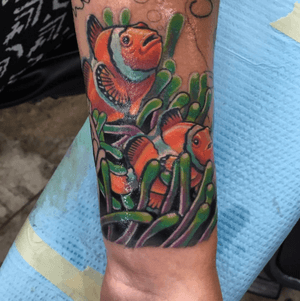 Some little clown fish done on a wrist as part of a full underwater sleeve. 
