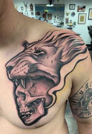 Work in progress piece. Client came to me with an idea and I put together this for him! #blackandgrey #lion #skull #skulltattoo #bishoprotary #silverbackink #truegrips 