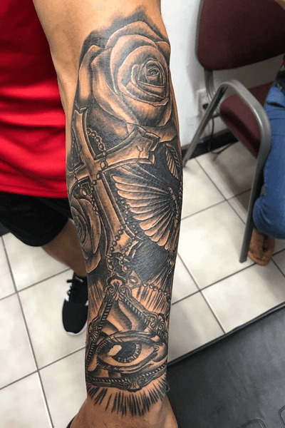 Great start to this sleeve cant wait to go back into it #cross #rosary #rose #blackandgrey #Intenzetattooink #allegory #fkirons 