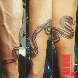 Snake on forearm...#snaketattoos #rattlesnake #forearmtattoo #flashart #design #graphic #wraparound #blackandgrey #byjncustoms 