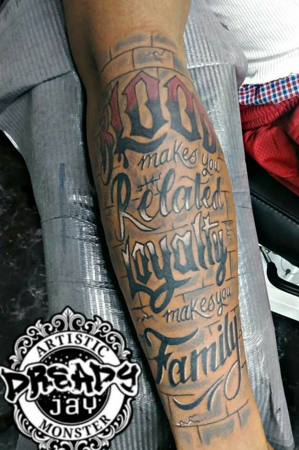 Cardi Bs Loyalty Over Royalty Arm Tattoo  Cardi Bs Face Tattoo Is a  Tribute to Her Son  POPSUGAR Beauty Photo 8