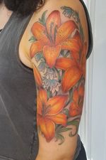 Orange lily halfsleeve #tattoo #tattoolife #tattooart #flowertattoos #ColorfulTattoos #rosewatertattoo #tattoos #tattooartist #art #ink #inked #lynntattoos #inkedmag #portland #portlandtattooers #portlandtattoo #pdx #pdxartists #pdxtattooers #pdxtattoo #tattooed #tatsoul #fusiontattooink #fkirons #bestink #vegan #tattoosnob #lillies #crueltyfree #eternalink
