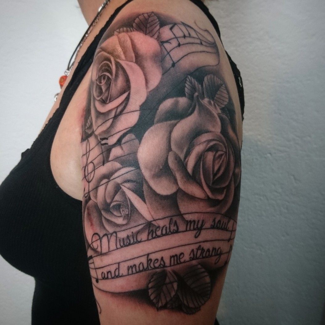 Tattoo uploaded by Monica  Music note paper folded into a rose I got this  for my grand mother who passed and my mother One of my favorite tattoos on  my body 