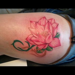 Lotus flower tattoo on thigh... 