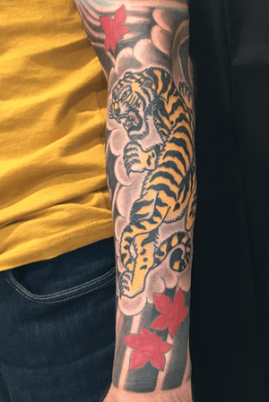 Tiger irezumi in sumi background with maple by Carl Hallowell for longtime customer and guitar wizard Mr Wells... #traditionaljapanese #irezumi #tiger #mapleleaf #fullcolor #fullsleeve #Japanesestyle #japanesesleeve #CarlHallowell