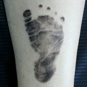 Foot print tattoo