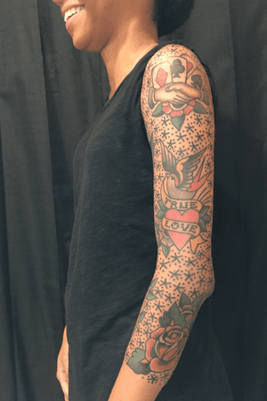 3/4 sleeve by Carl Hallowell for Ms S- good luck, love, and beauty tattoos, star and dot background... #traditionalamerican #traditionaltattoo #traditionalstyle #womenwithtattoos #sleeve #swallow #heart #rose #goodluck #stars #dallastattooartist #texas #CarlHallowell