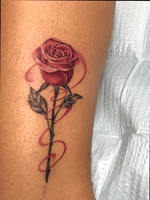Close up to a small rose done on the ankle 