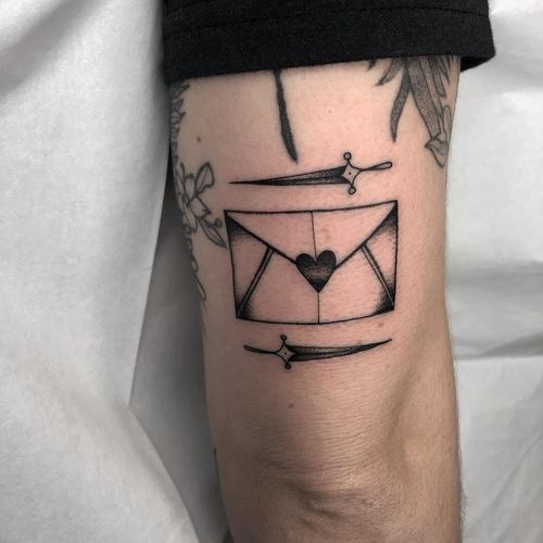 Tattoo by Tine Defiore #TineDefiore #valentinesdaytattoos #valentinestattoos #valentinesday #valentines #love #envelope #letter #heart #sword #dagger