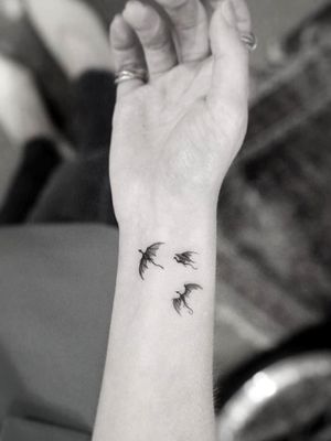 Emilia Clarke's dragons tattoo, inspired by Game of Thrones. Inked by Dr Woo.