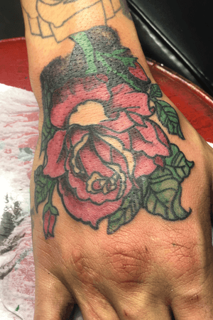 Coverup hand rose tattoo