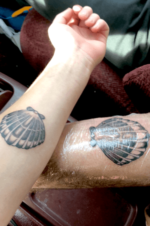 Matching tattoo with my dad! Scallop shell for our family crest! #familycrest #family #judge #lastname #matchingtattoos #shell #scallop #clam #dad #parent #coloradotattooartist #colorado #blackandgrey #new #forearm #forearmtattoo #startingsleeve #sleeve 